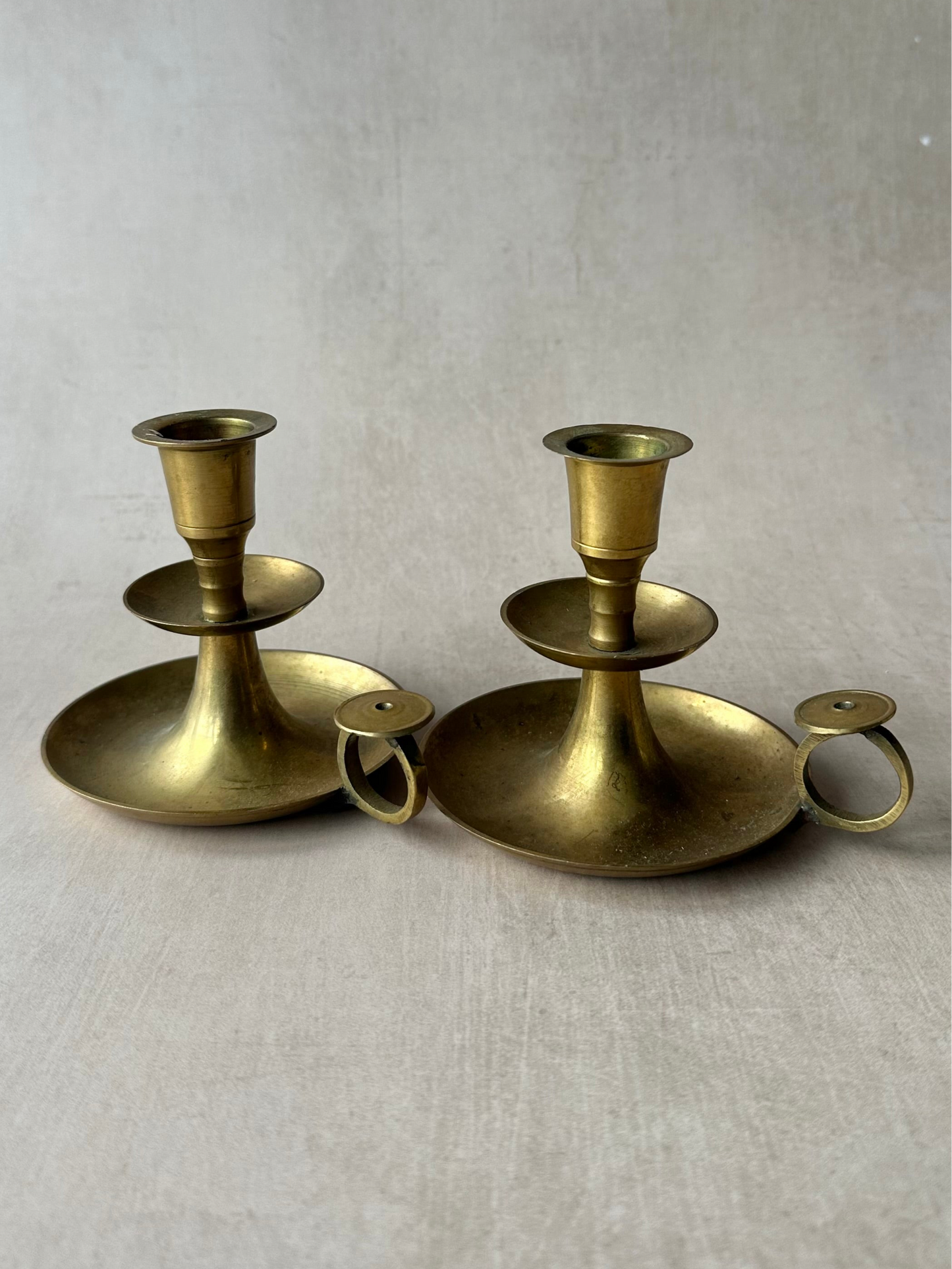 Set of Two Brass Fingerhold Candlestick Holder