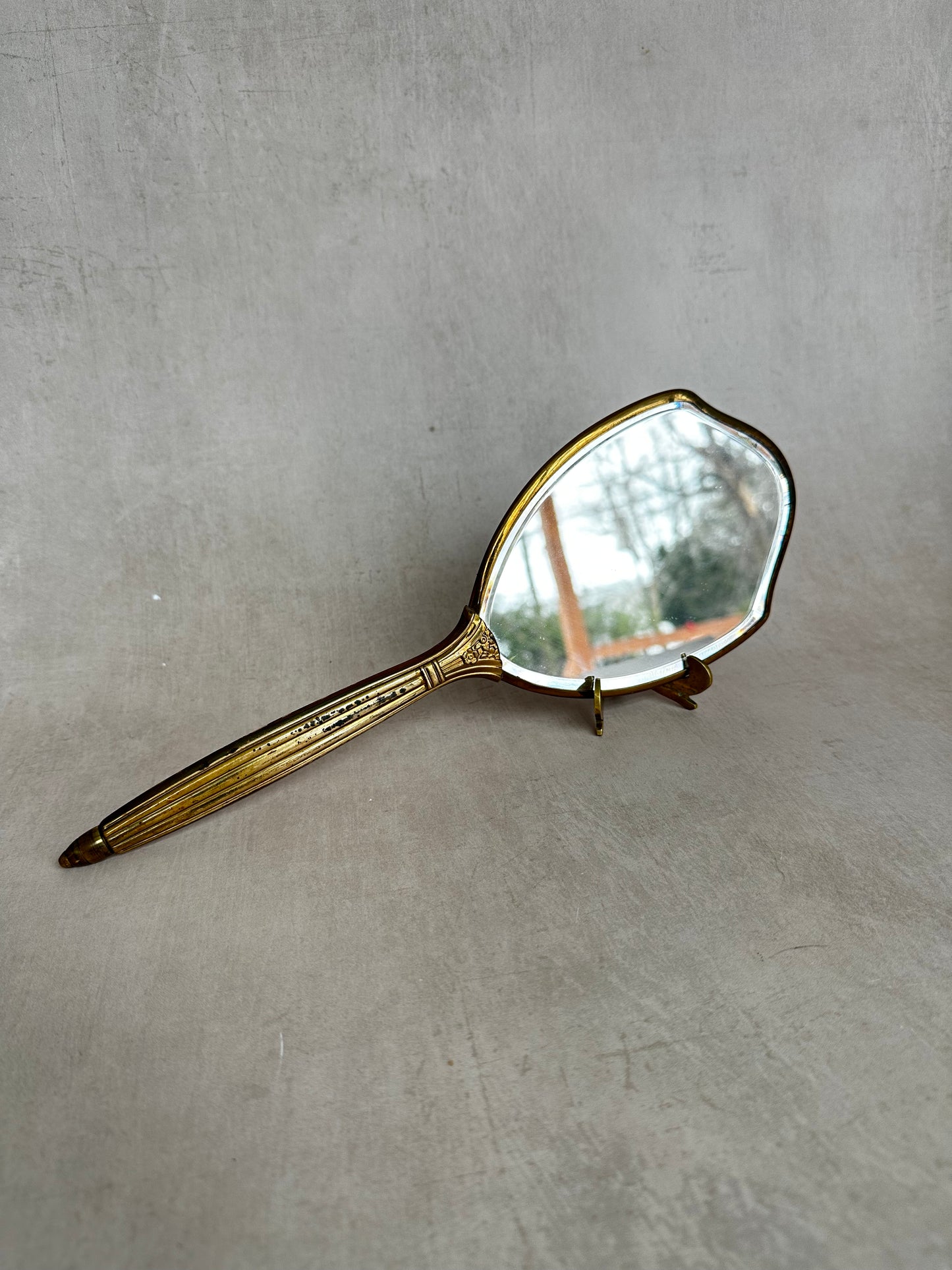 Miroir à main vintage en laiton