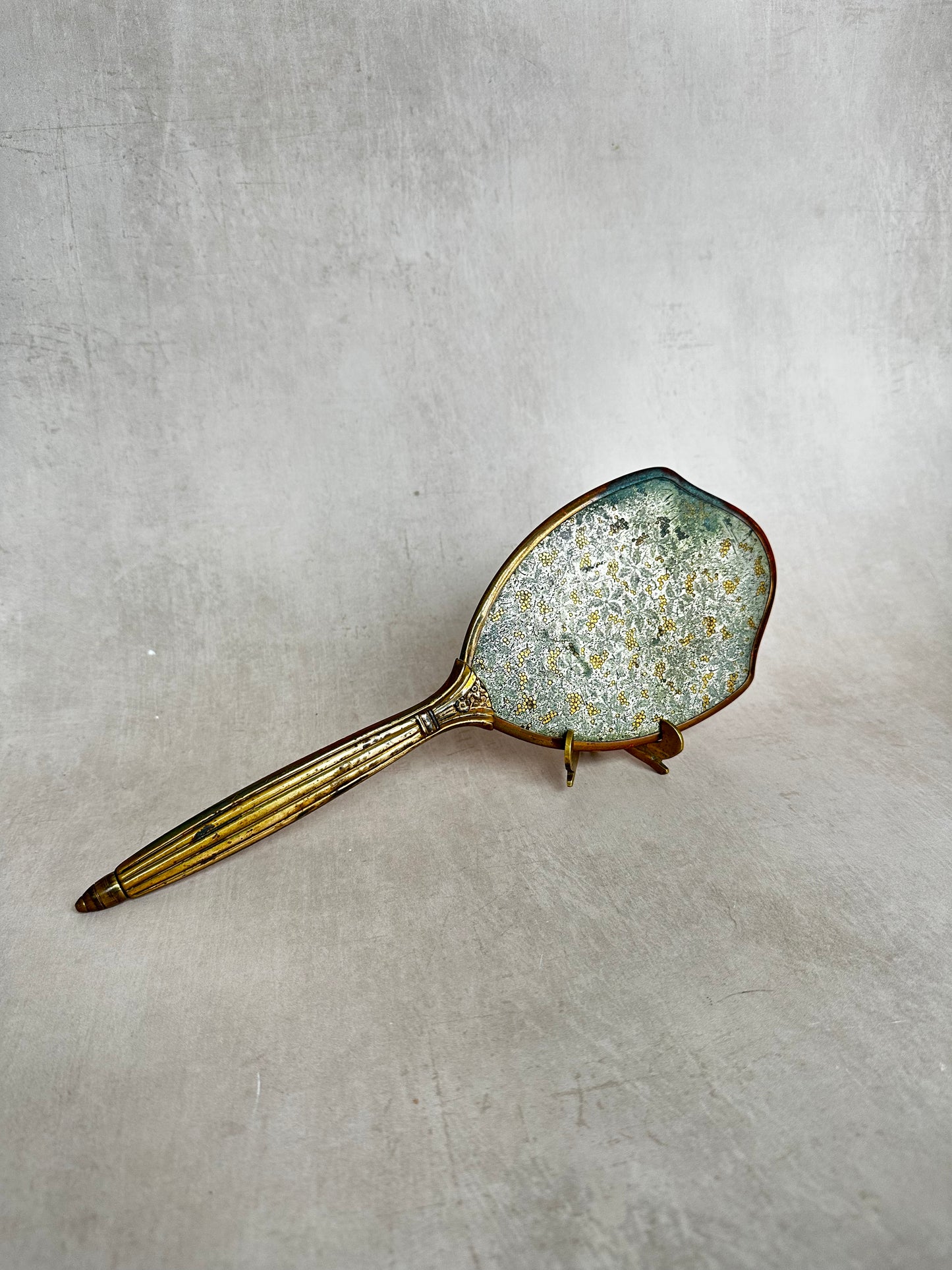 Miroir à main vintage en laiton