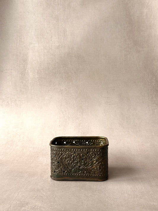 Square bronze embossed container